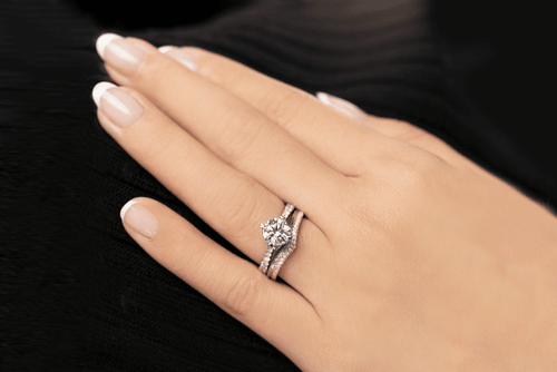 Wedding ring that clearance fits around engagement ring