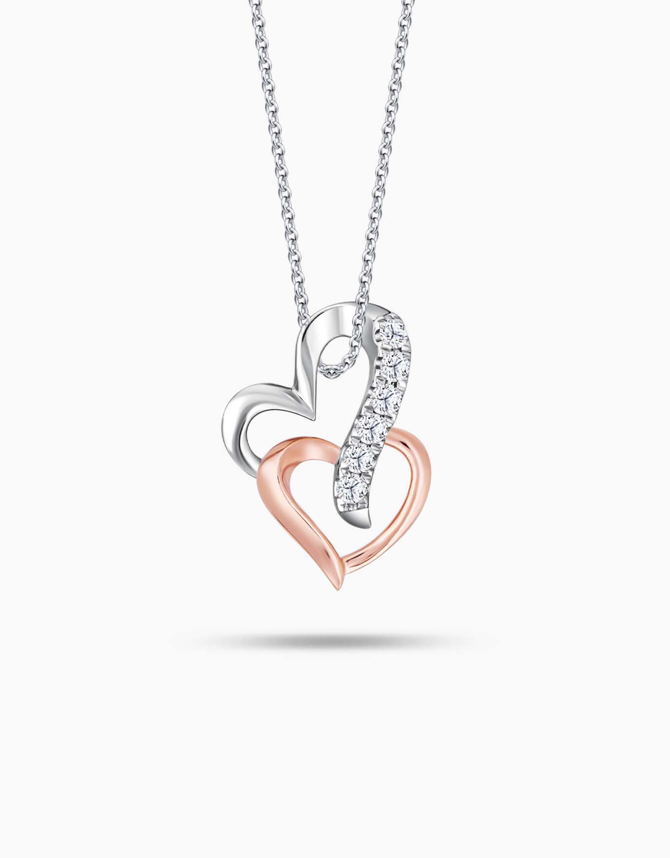0.32 CTW Canadian Diamond Intertwined Heart Pendant in Yellow Gold